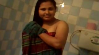 Big boobs Indian wife taking shower