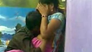 Bihari young college couple in a friend studio kissing