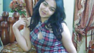 Busty Indian girl in her bedroom posing