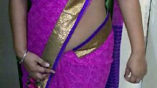 Indian homemaker stripping her traditional Indian outfits